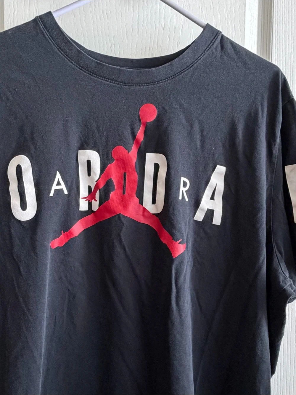 Jordan Black Short Sleeve Tee with Red Jumpman and White Jordan Text